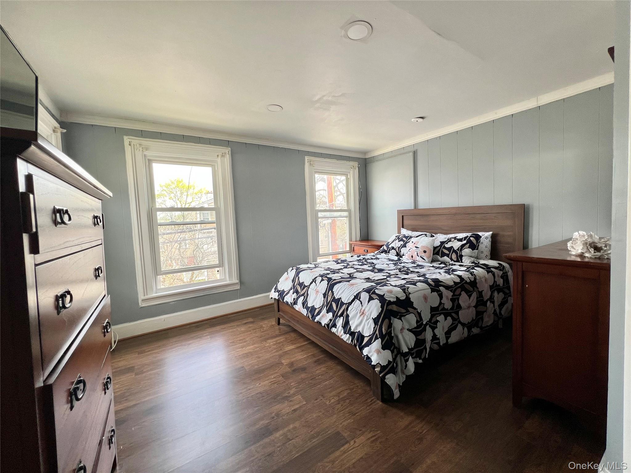 34 Smith Street Poughkeepsie, NY 12601 - Photo 24 of 46 a bedroom with a bed and a window