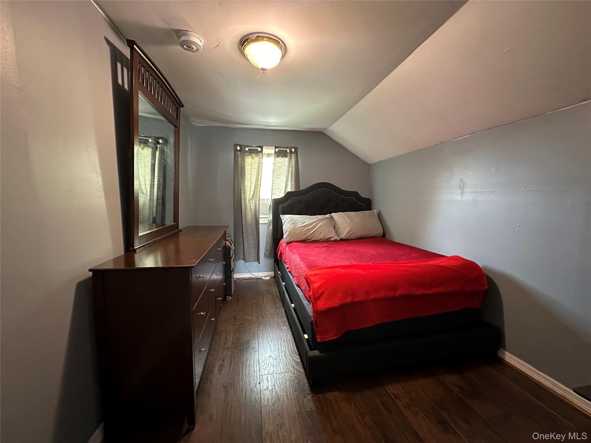 34 Smith Street Poughkeepsie, NY 12601 - Photo 26 of 46 a bedroom with a bed and window