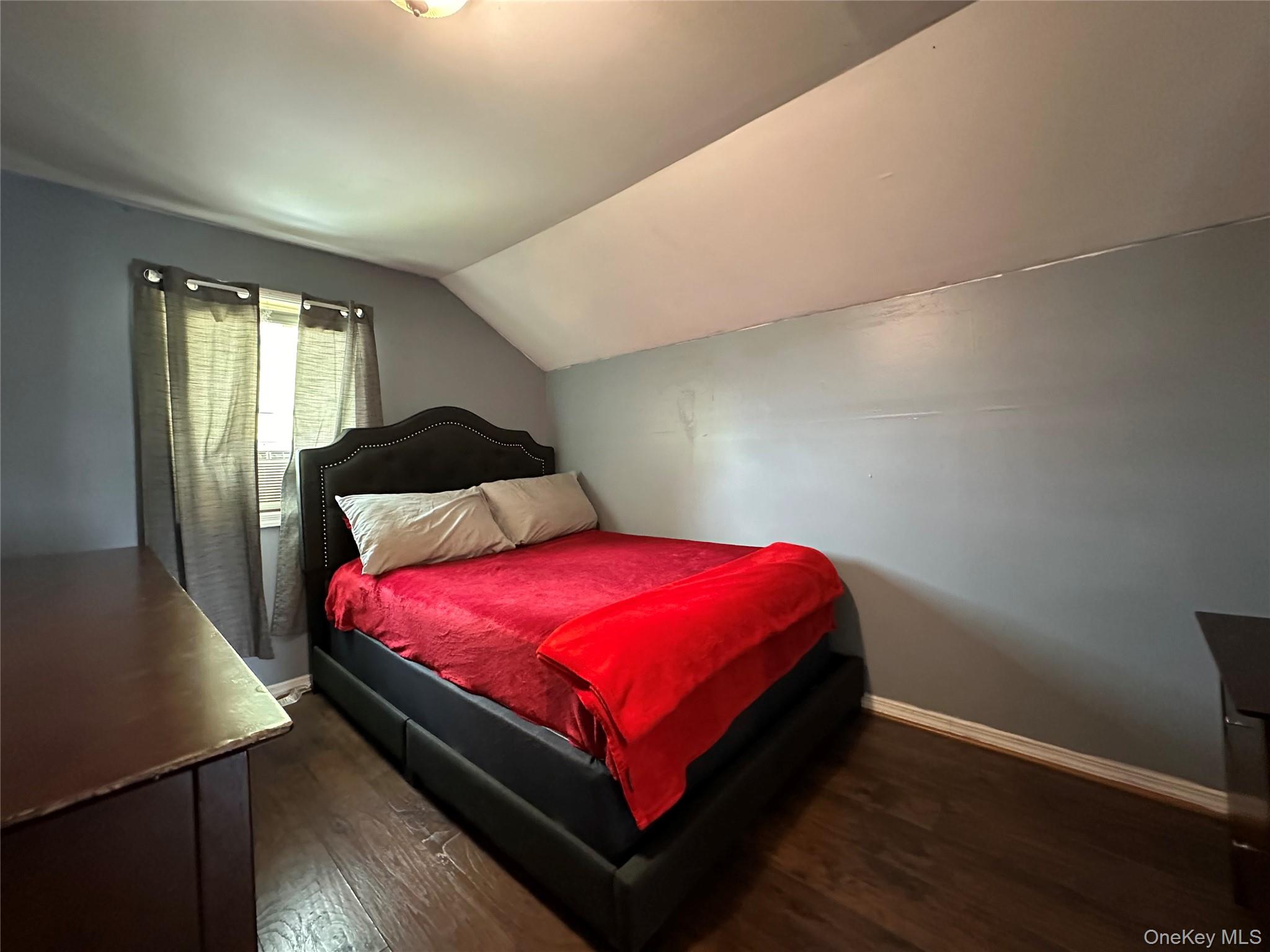 34 Smith Street Poughkeepsie, NY 12601 - Photo 27 of 46 a bedroom with a bed and window