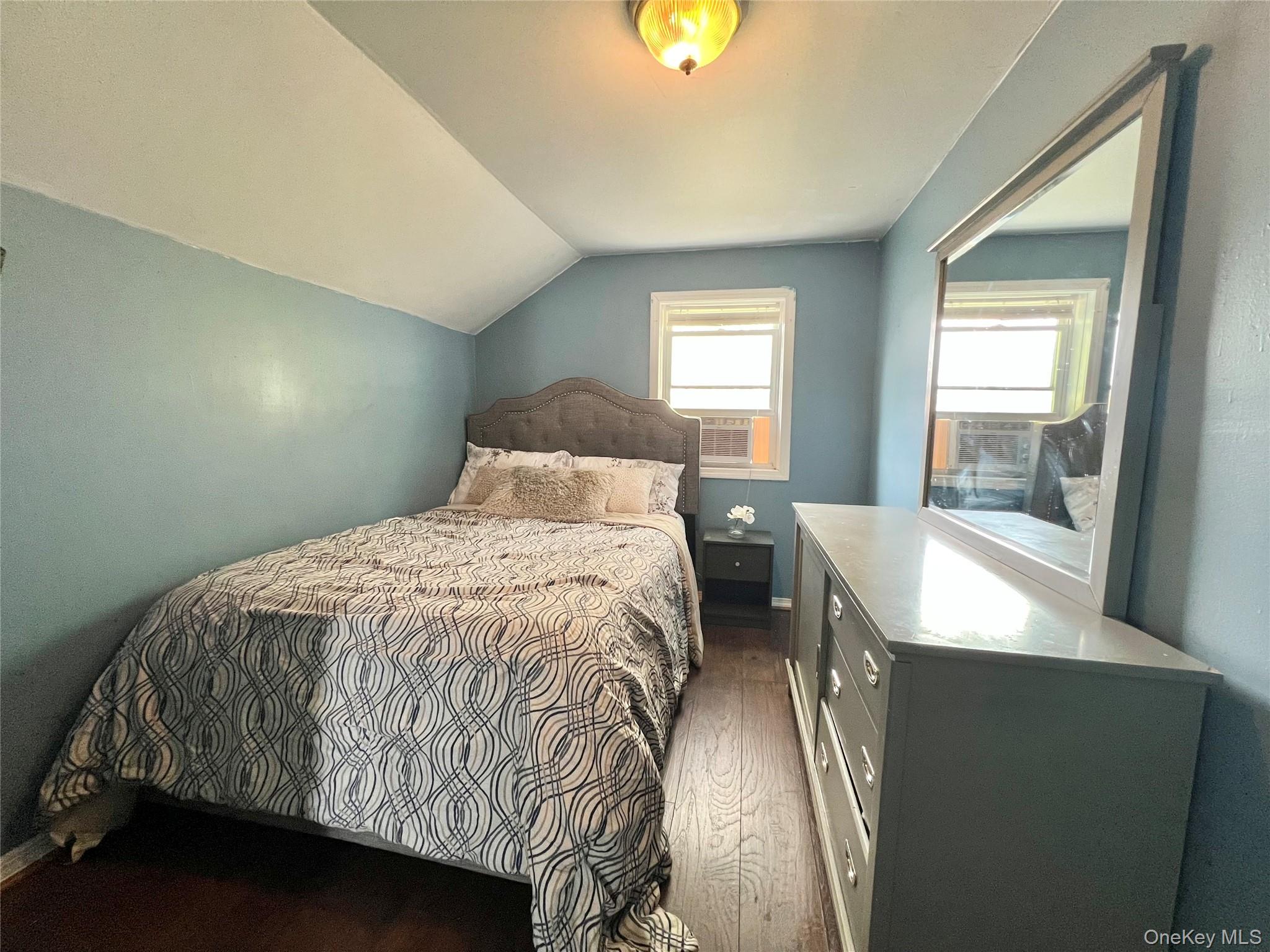 34 Smith Street Poughkeepsie, NY 12601 - Photo 31 of 46 a bedroom with a bed and a window