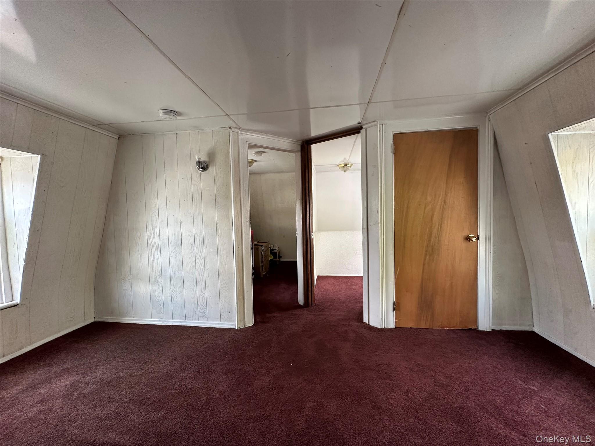 34 Smith Street Poughkeepsie, NY 12601 - Photo 36 of 46 an empty room with windows and closet
