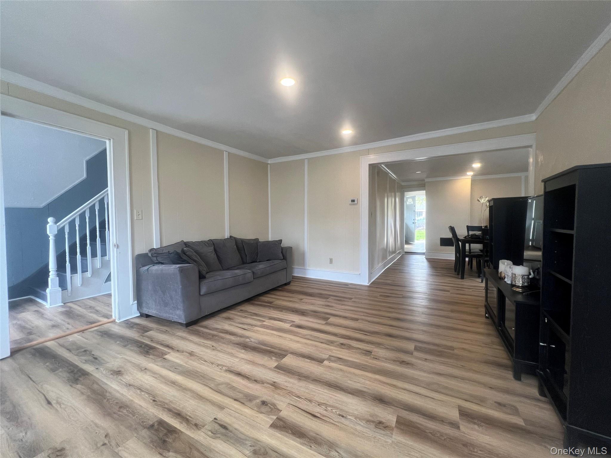 34 Smith Street Poughkeepsie, NY 12601 - Photo 5 of 46 a living room with furniture and a flat screen tv