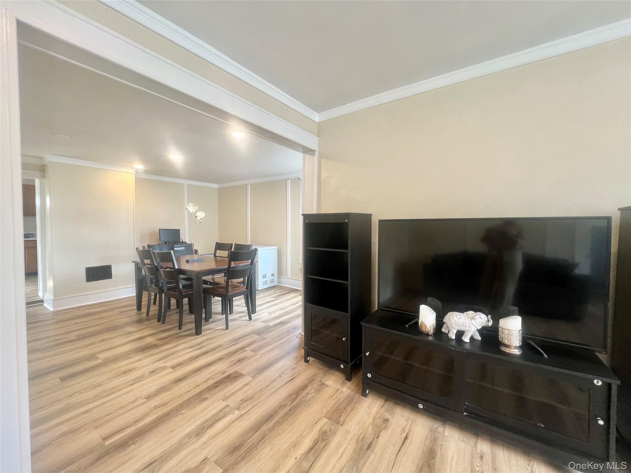 34 Smith Street Poughkeepsie, NY 12601 - Photo 7 of 46 a dining room with furniture and wooden floor