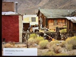233 Goolsby Ranch Road Benton, CA 93512 - Photo 6 of 7 a view of a house with yard