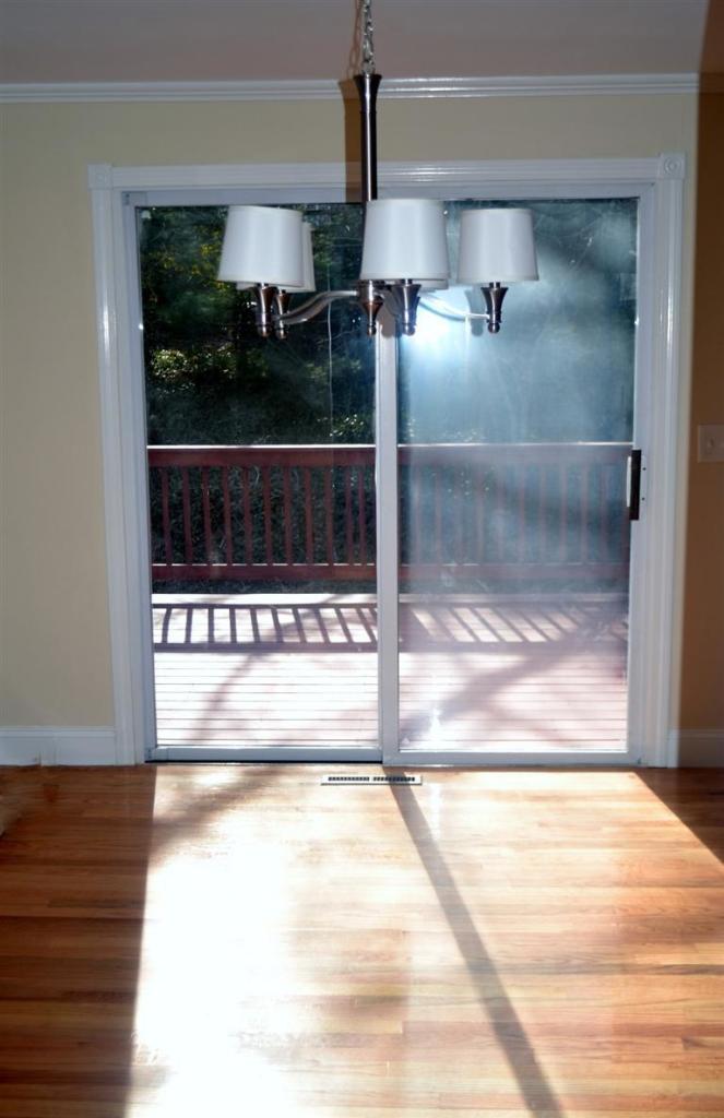 147 Straightway Hyannis, MA 02601 - Photo 12 of 31 a view of a glass door with a yard