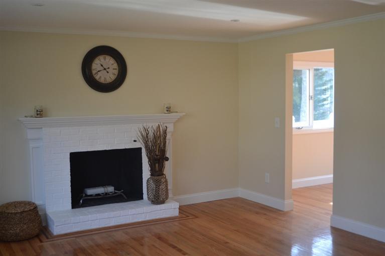 147 Straightway Hyannis, MA 02601 - Photo 2 of 31 a view of a livingroom with a fireplace and a window