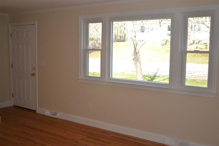 147 Straightway Hyannis, MA 02601 - Photo 4 of 31 a view of an empty room with wooden floor and a window