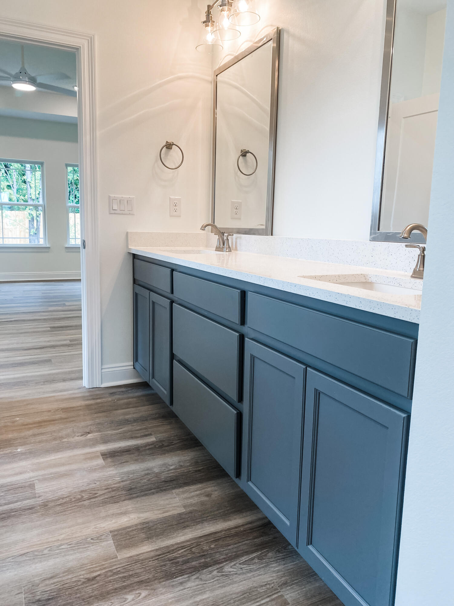 5464 Jenee Court Crestview, FL 32539 - Photo 9 of 10 a bathroom with a sink and a mirror