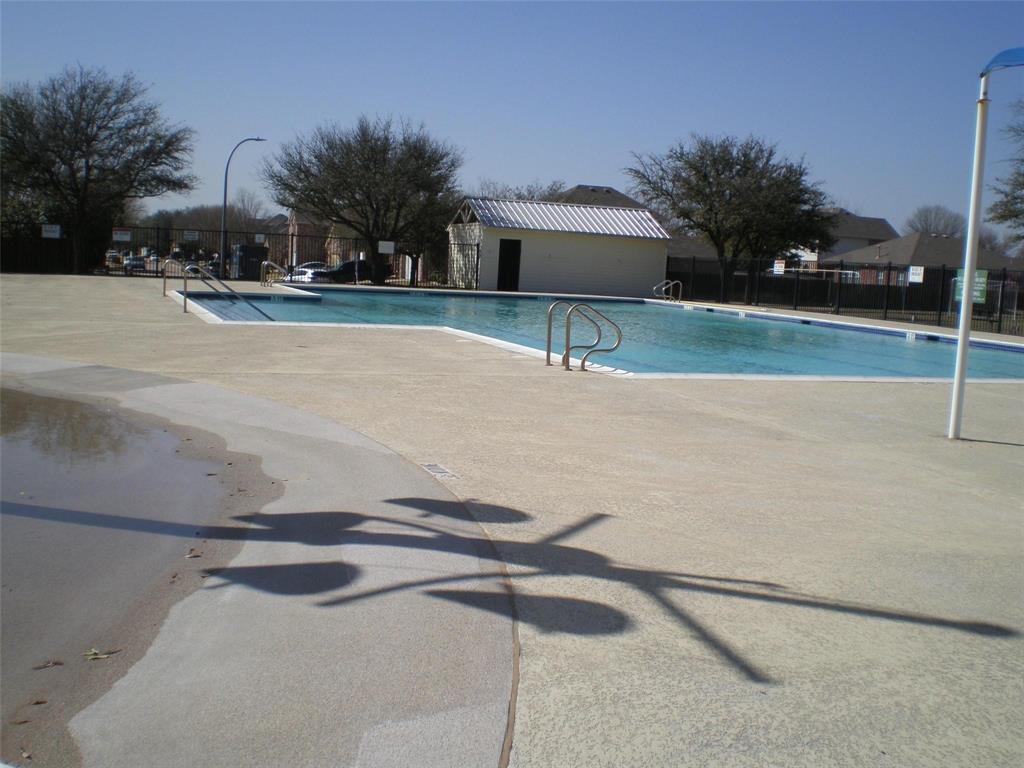 2836 Morning Star Drive Fort Worth, TX 76131 - Photo 26 of 27 a palm tree sitting in front of a house with a yard