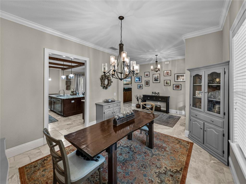 3985 Mammoth Grove Road Lake Wales, FL 33898 - Photo 16 of 97 a view of a dining room with furniture
