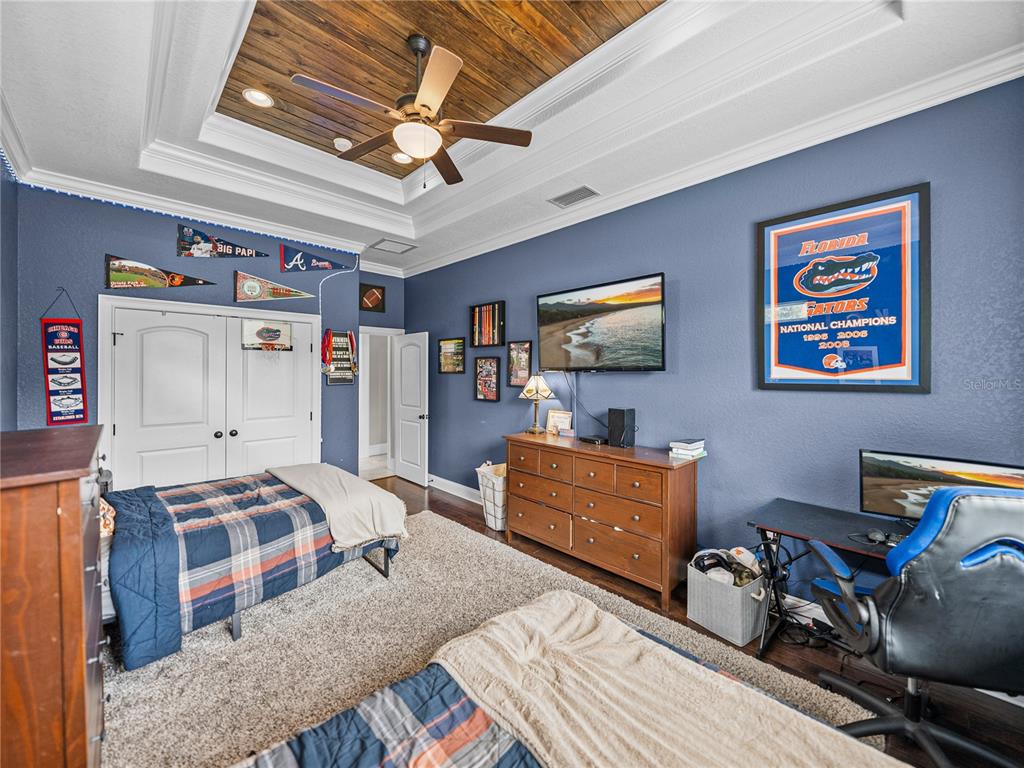 3985 Mammoth Grove Road Lake Wales, FL 33898 - Photo 50 of 97 a bedroom with furniture and a flat screen tv