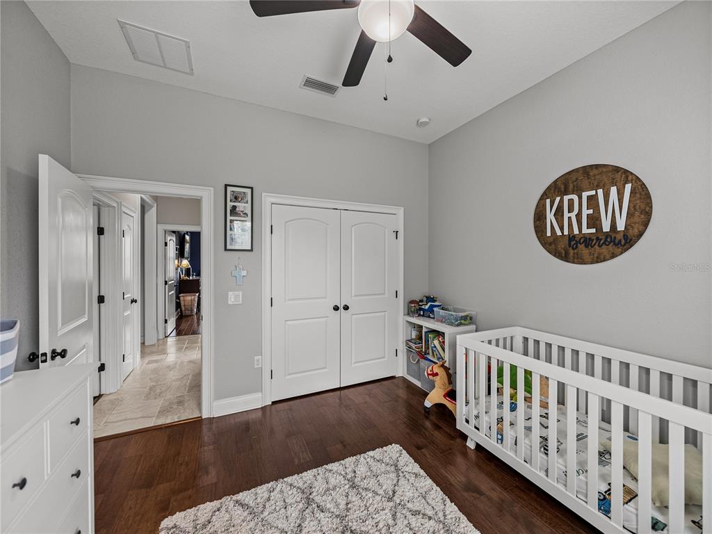 3985 Mammoth Grove Road Lake Wales, FL 33898 - Photo 61 of 97 a view of a hallway with wooden floor and windows