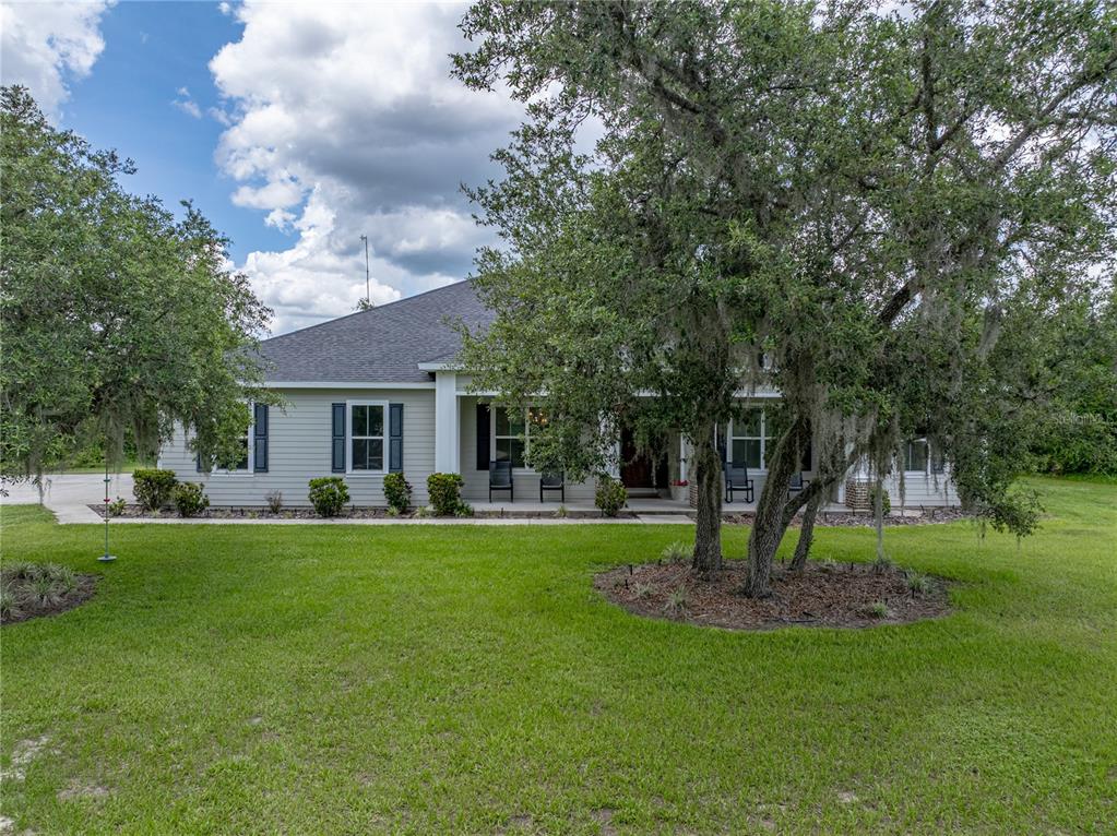 3985 Mammoth Grove Road Lake Wales, FL 33898 - Photo 79 of 97 a house with swimming pool in front of it