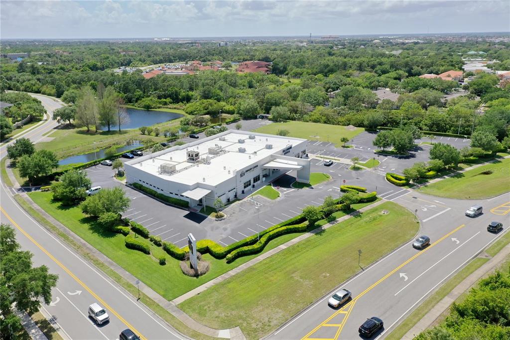 7965 Spyglass Hill Road Melbourne, FL 32940 - Photo 2 of 12 an aerial view of a residential houses with outdoor space and street view