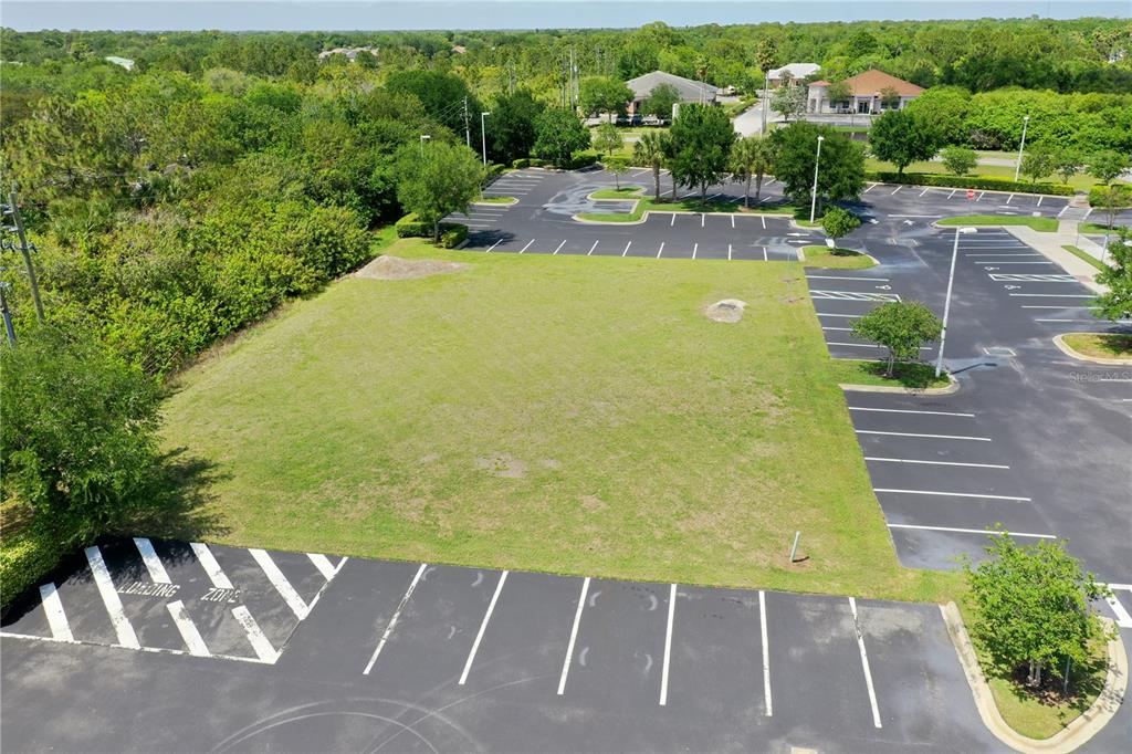 7965 Spyglass Hill Road Melbourne, FL 32940 - Photo 3 of 12 a view of a swimming pool with a yard