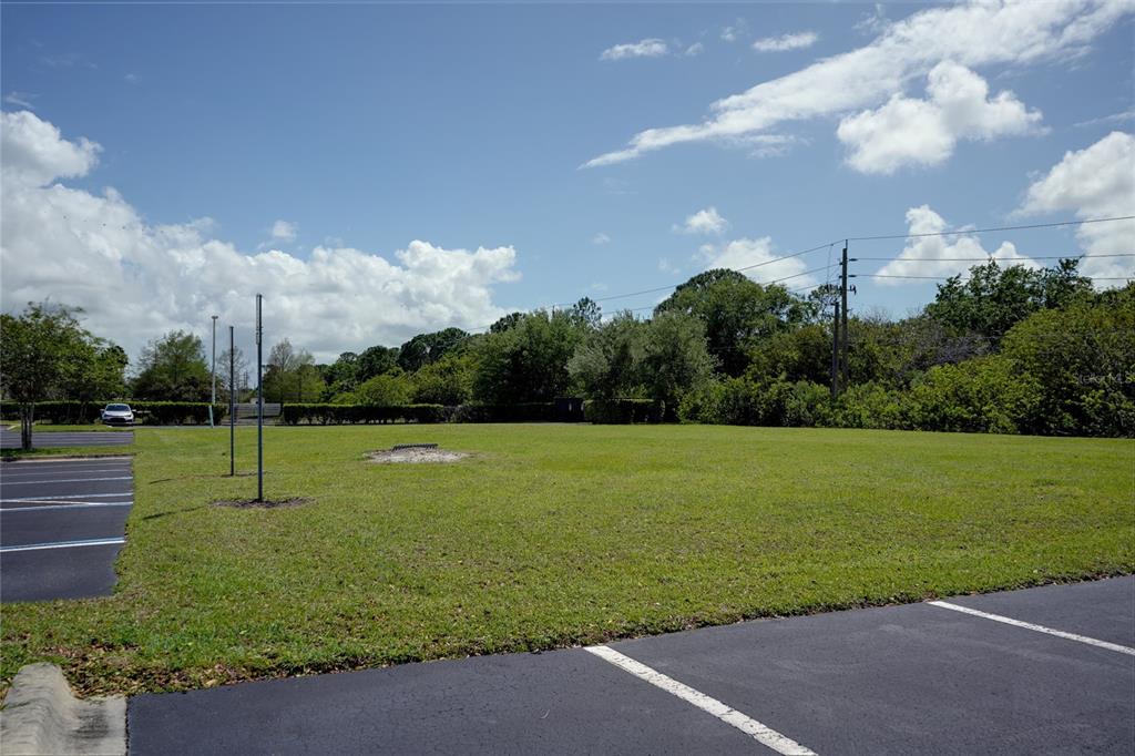 7965 Spyglass Hill Road Melbourne, FL 32940 - Photo 6 of 12 a view of a golf course with a lake