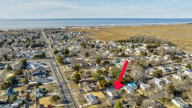 a view of a two chairs in the balcony