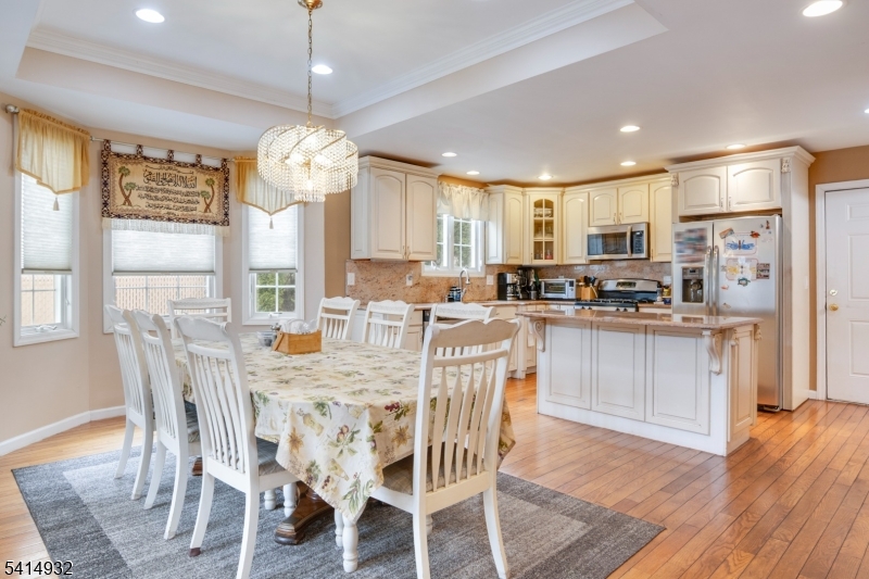 36 Harrison Street Nutley, NJ 07110 - Photo 11 of 36 a view of a dining room with furniture window and wooden floor