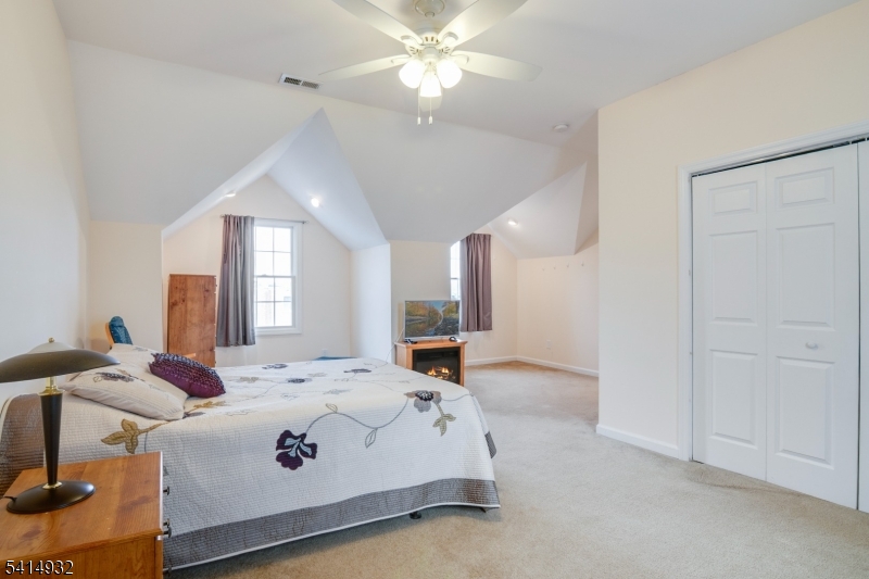 36 Harrison Street Nutley, NJ 07110 - Photo 28 of 36 a bedroom with a bed and window