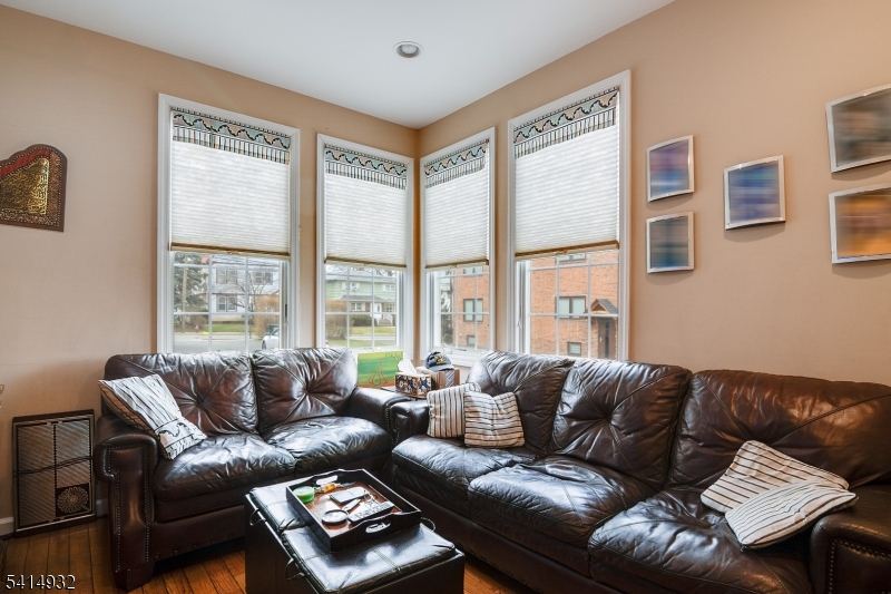 36 Harrison Street Nutley, NJ 07110 - Photo 32 of 36 a living room with furniture and a large window