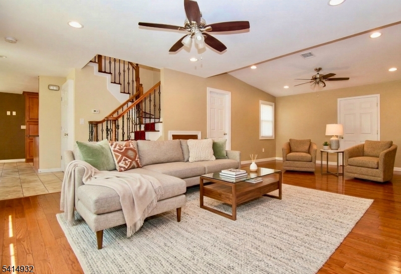 36 Harrison Street Nutley, NJ 07110 - Photo 5 of 36 a living room with furniture and a rug