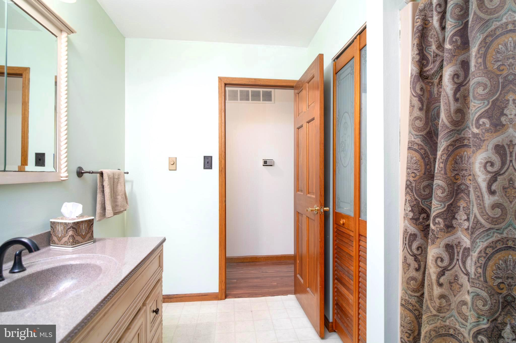 38 Summit Drive Tabernacle, NJ 08088 - Photo 20 of 42 a bathroom with a tub sink and mirror