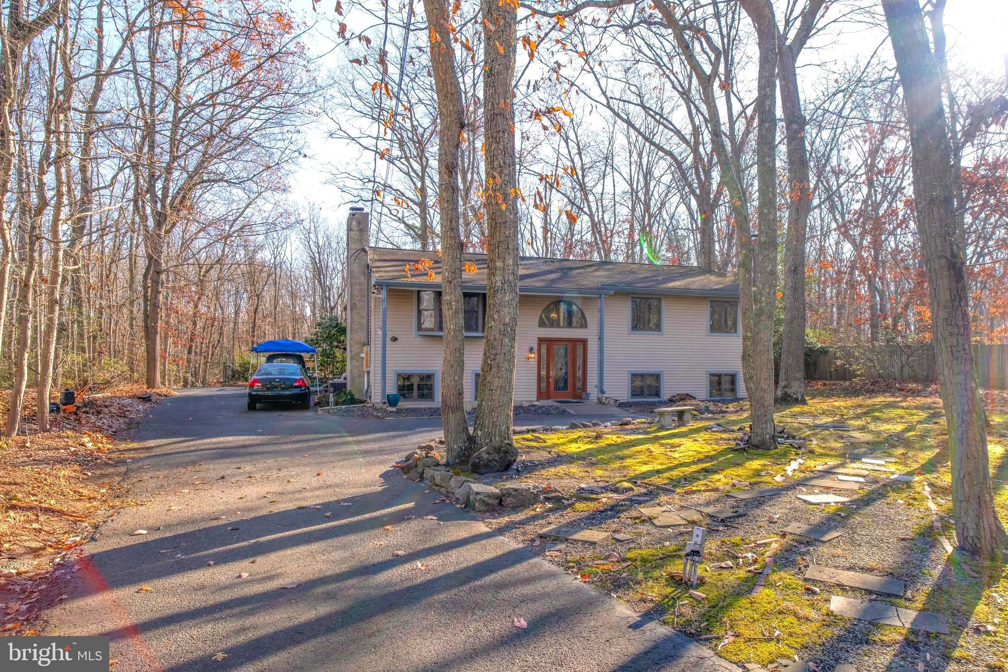 38 Summit Drive Tabernacle, NJ 08088 - Photo 2 of 42 a view of a house with snow on the side of the road