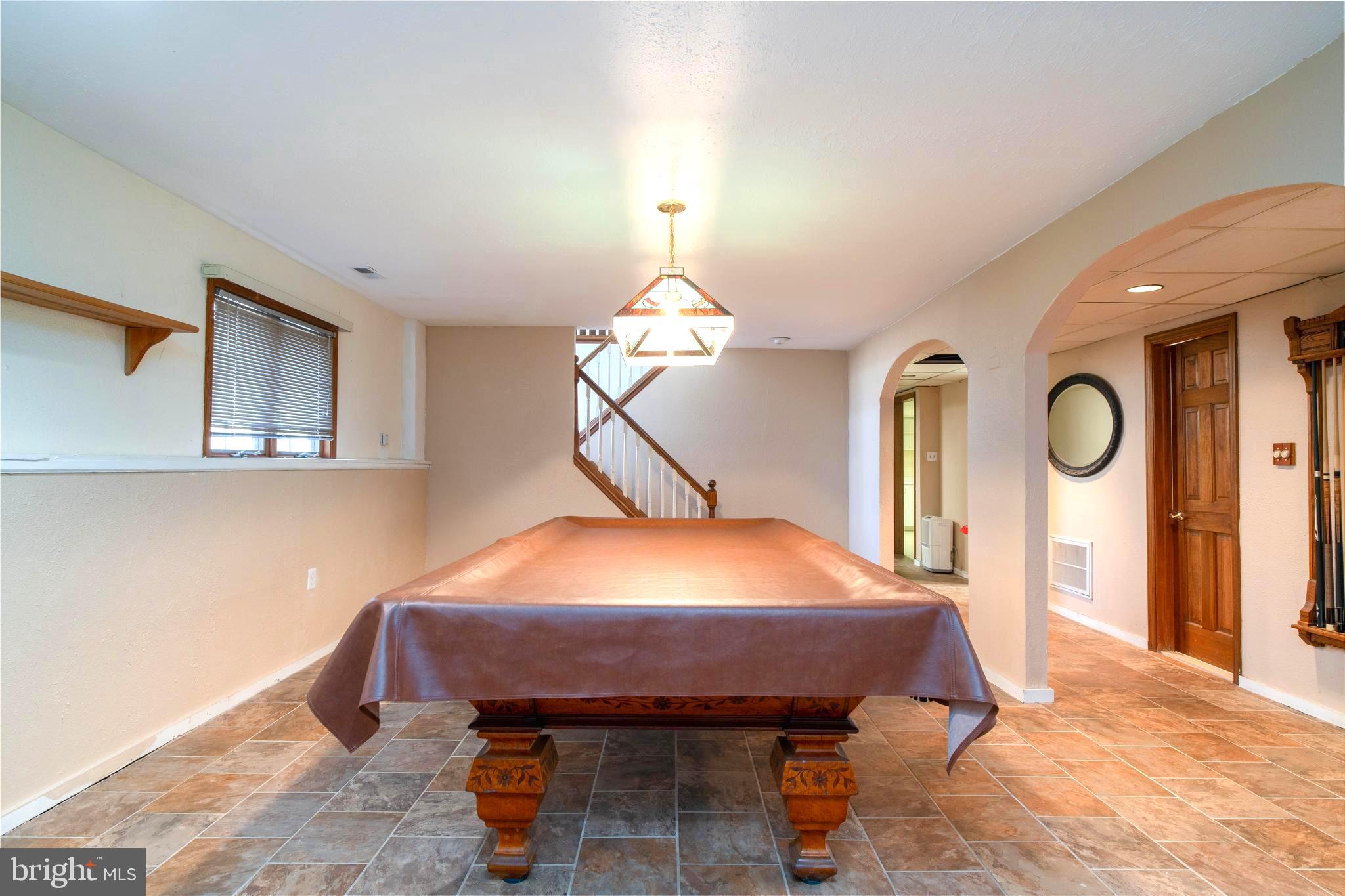 38 Summit Drive Tabernacle, NJ 08088 - Photo 26 of 42 a bed room with a bed and a chandelier