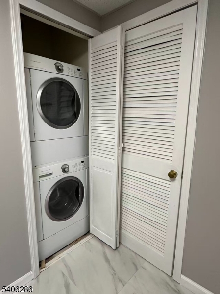 95 Jamestown Road, Unit 95 Bernards, NJ 07920 - Photo 13 of 17 a close up view of a washer and dryer in a room