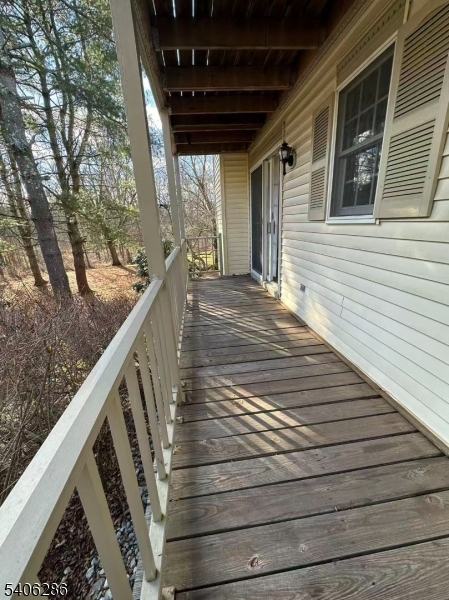 95 Jamestown Road, Unit 95 Bernards, NJ 07920 - Photo 14 of 17 a view of deck with wooden floor and stairs