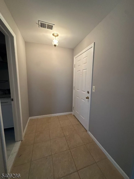 95 Jamestown Road, Unit 95 Bernards, NJ 07920 - Photo 3 of 17 a view of an empty room