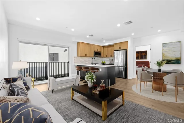 a bedroom with a bed and dresser