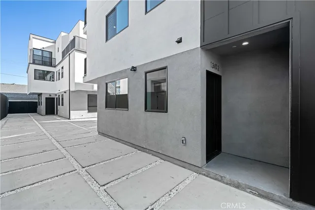 a view of a street with a building