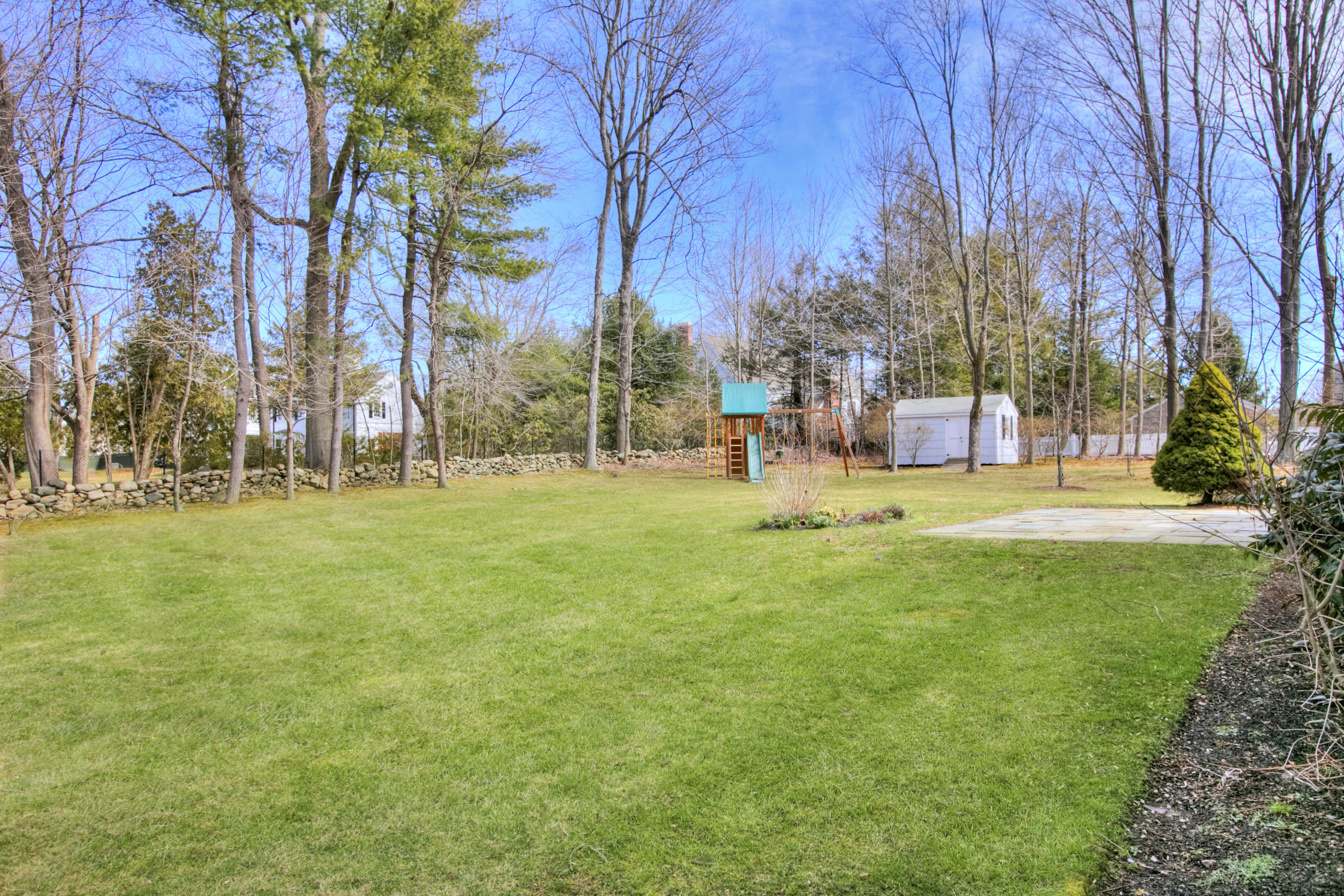27 Summit Ridge Road New Canaan, CT 06840 - Photo 23 of 25 a view of a park with large trees