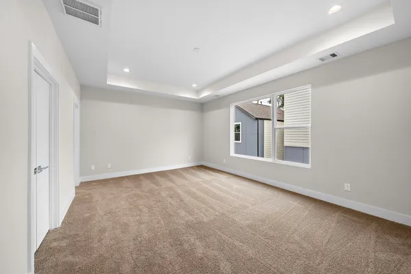 a view of an empty walk in closet