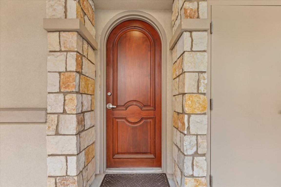 1812 West Avenue, Unit 306 Austin, TX 78701 - Photo 11 of 38 Property entrance featuring stone siding
