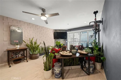 a view of a entryway with flower pots