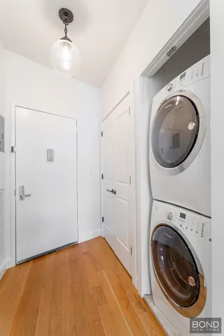 a view of a storage & utility room with washer and dryer