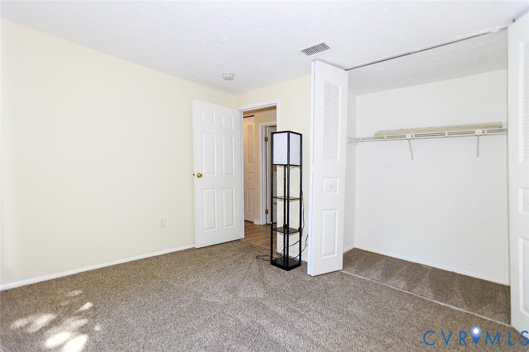 925 Fluvanna Road Newport News, VA 23601 - Photo 20 of 25 wooden floor in an empty room
