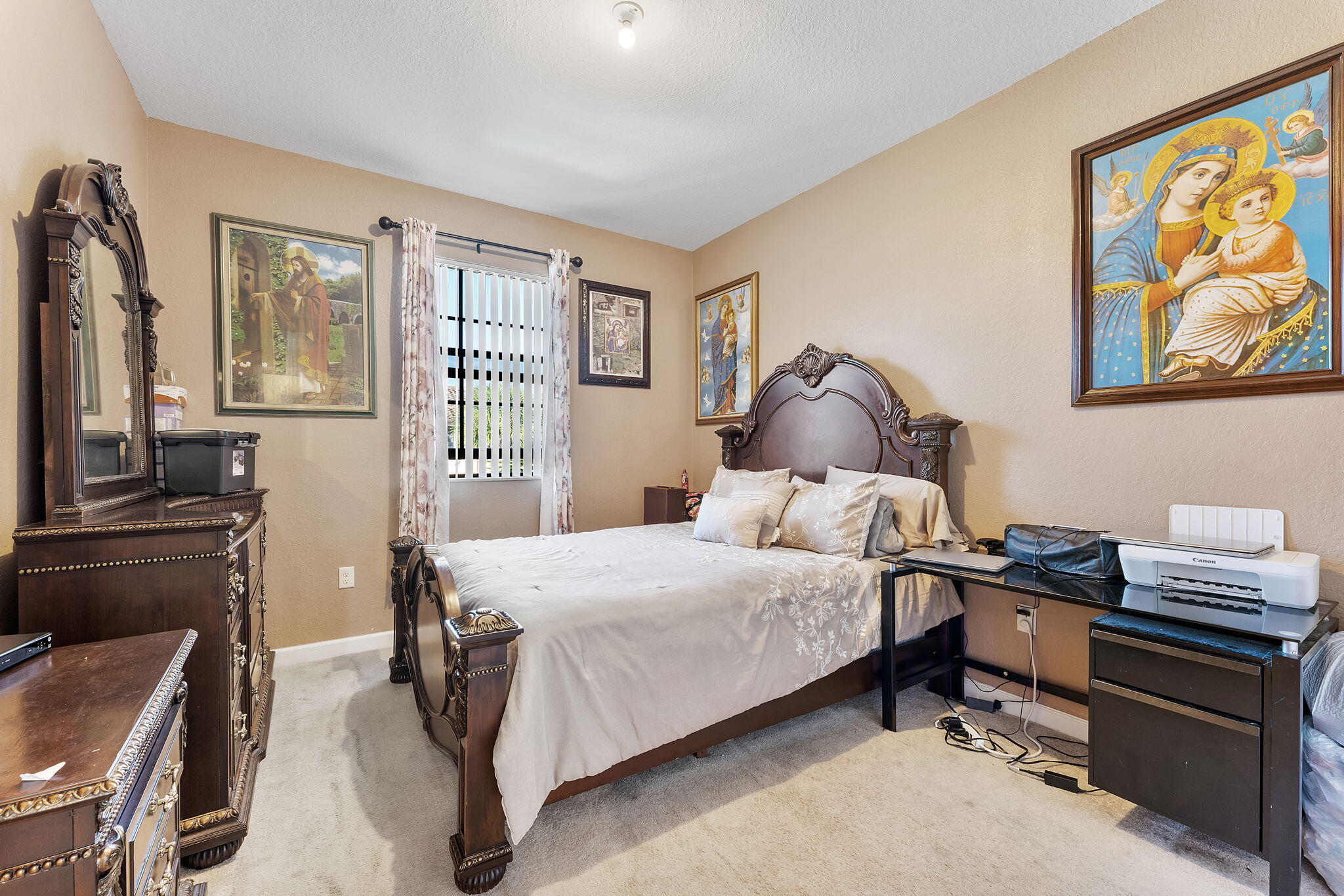 5438 Northwest 27th Street Margate, FL 33063 - Photo 23 of 50 a bedroom with a bed and a window