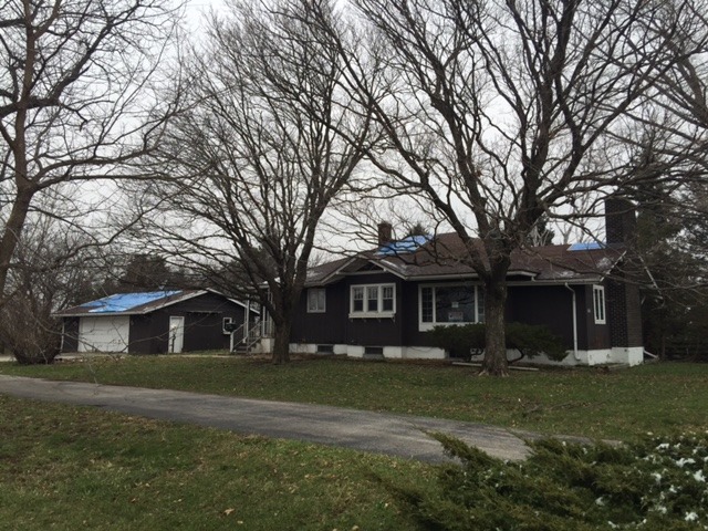 7172 Daysville Road Oregon, IL 61061 - Photo 1 of 13 a front view of a house with a yard