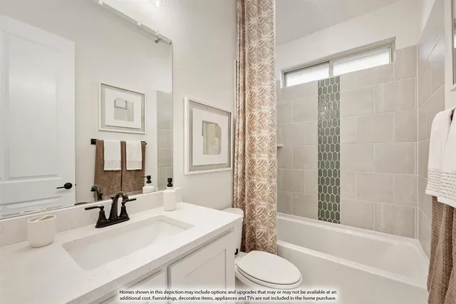 a bathroom with a granite countertop sink a toilet and shower