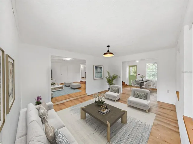 a living room with furniture and a couch