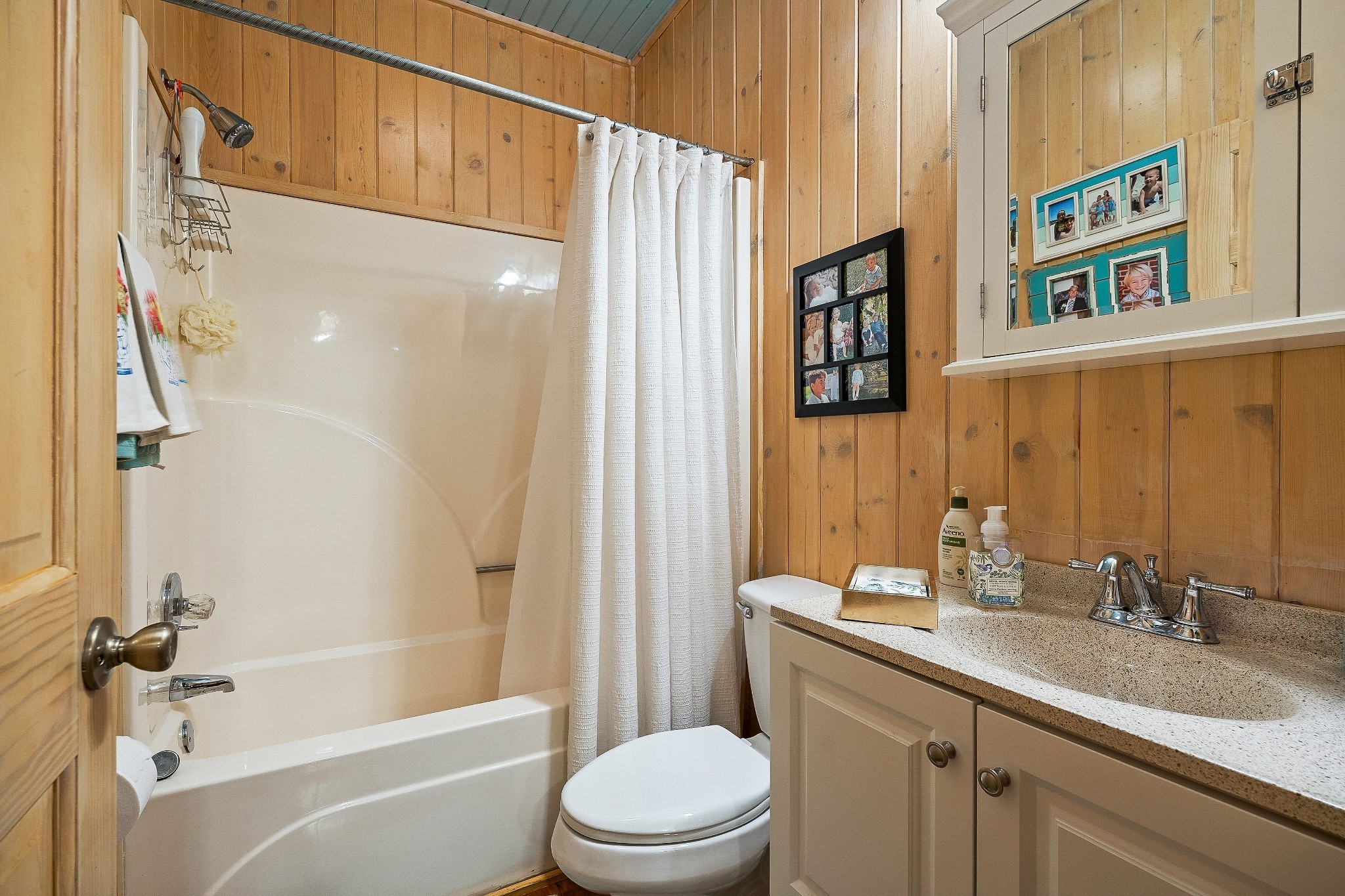 2541 Sparkman Town Road Doyle, TN 38559 - Photo 28 of 72 a bathroom with a granite countertop sink a toilet and shower