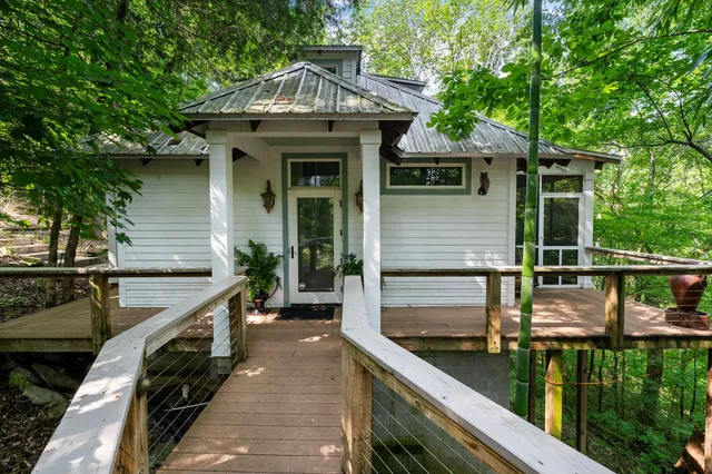 a view of swimming pool with outdoor seating