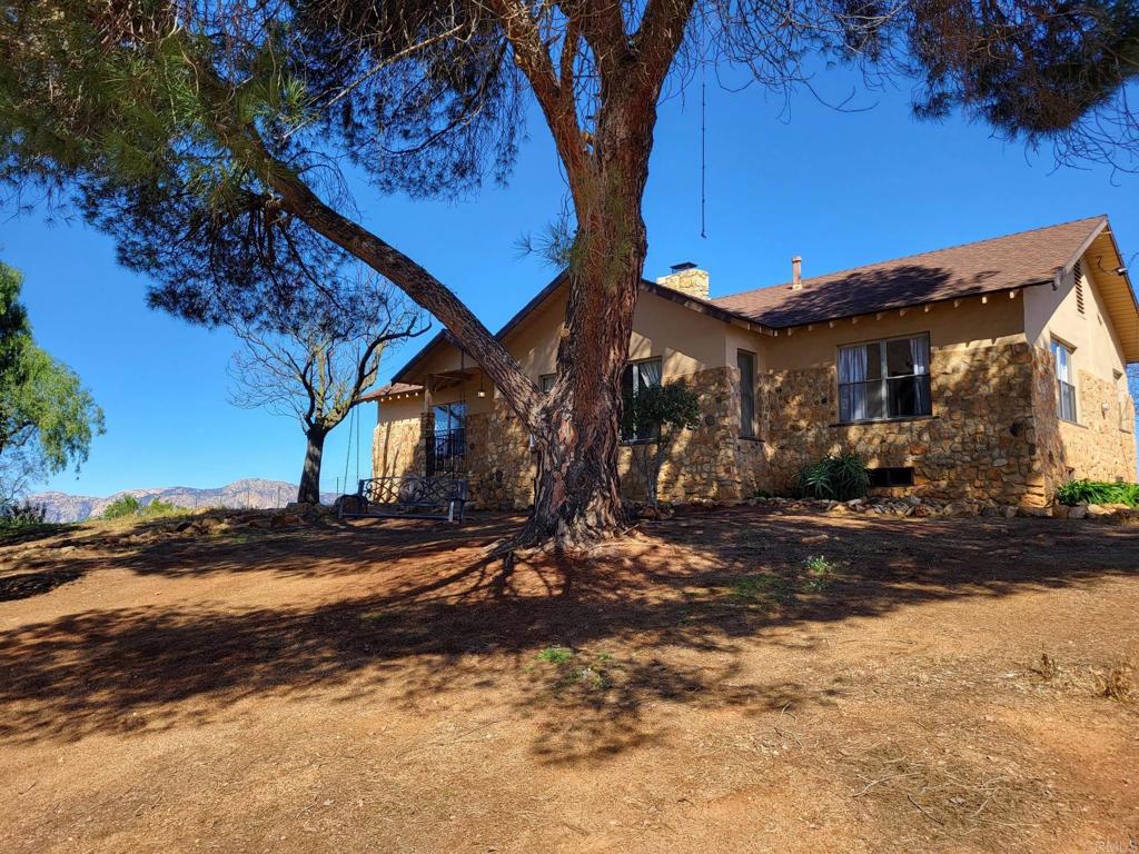 616 Alpine Heights Road Alpine, CA 91901 - Photo 28 of 50 a view of a house with a yard