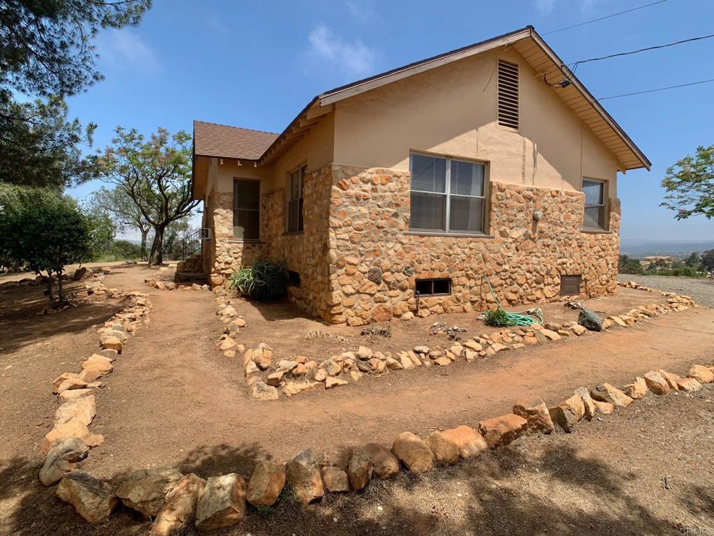 616 Alpine Heights Road Alpine, CA 91901 - Photo 29 of 50 a front view of a house with a yard