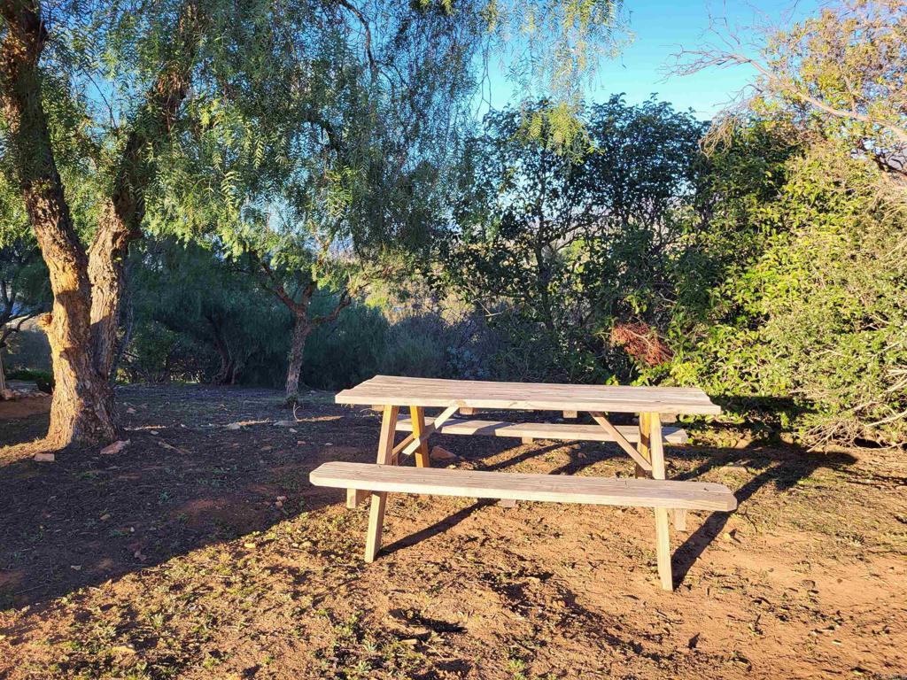 616 Alpine Heights Road Alpine, CA 91901 - Photo 31 of 50 a view of a bench in a backyard