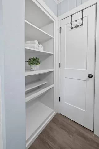 a view of an empty walk in closet