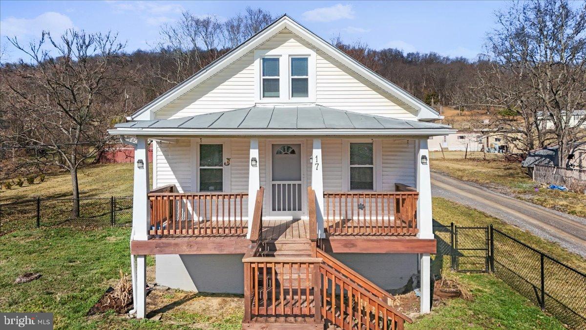 17 Turkey Hl Road Augusta, WV 26704 - Photo 1 of 33 a front view of a house with a porch